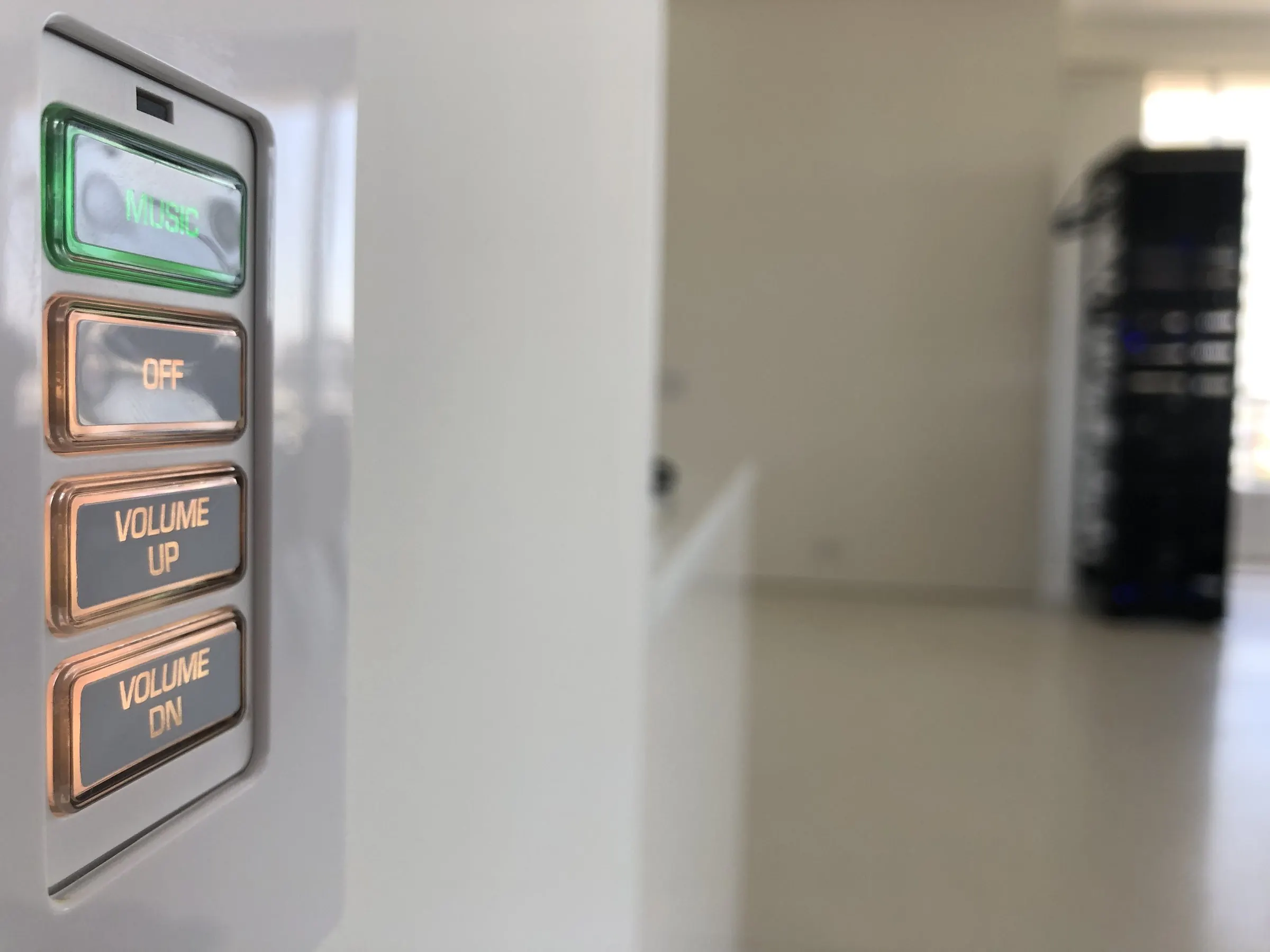 Backlit keypad with Music, Off, Volume Up, and Volume Down buttons