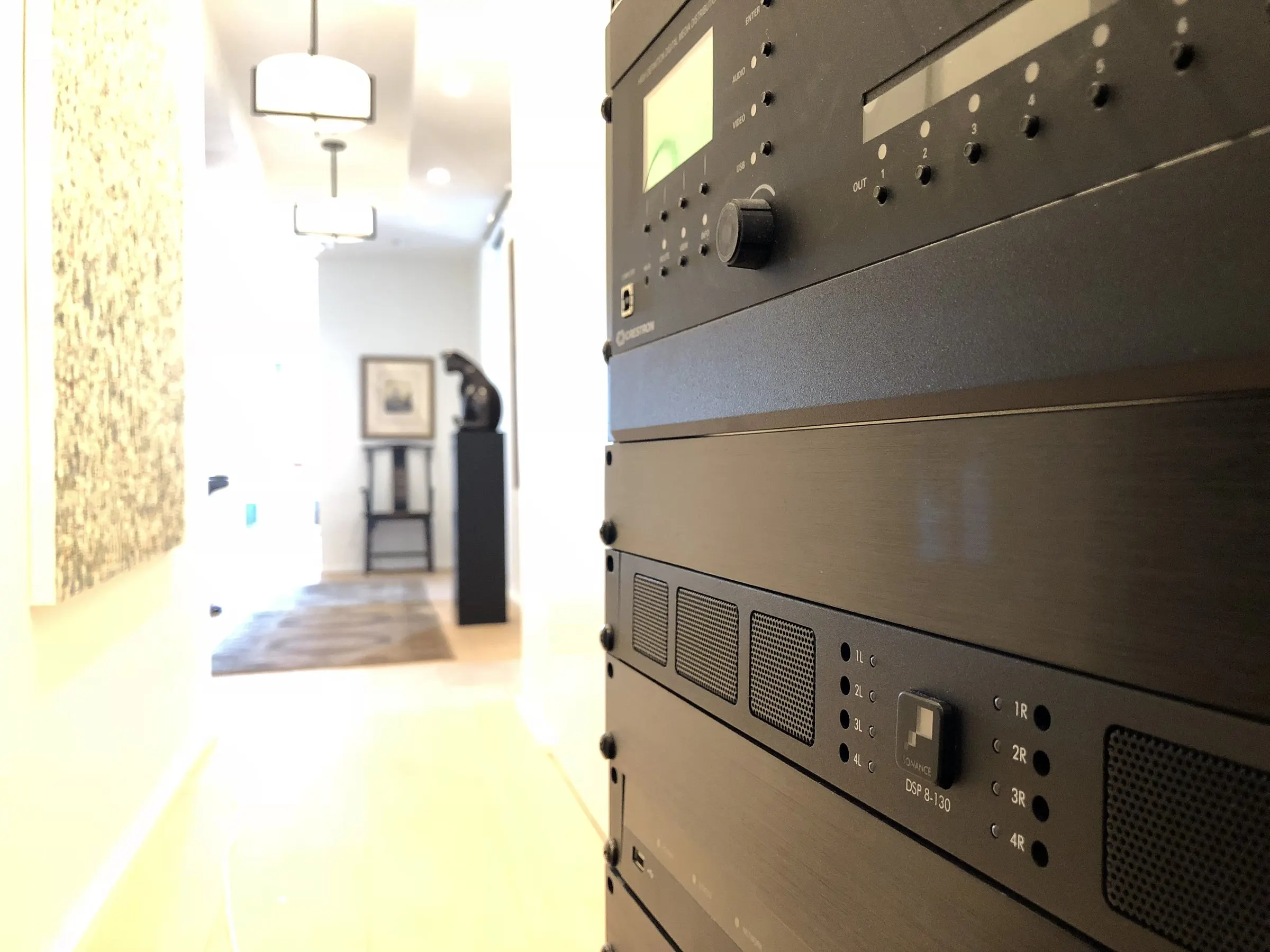 Close-up of a centralized lighting control panel in a hallway